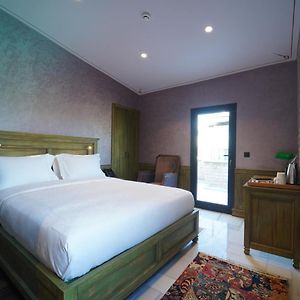 Kamer met een Queen Size Bed